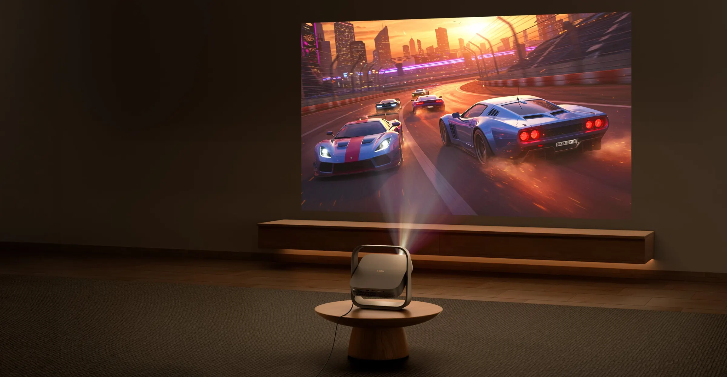 Elfin Flip 4K projecting a racing game onto a living-room wall